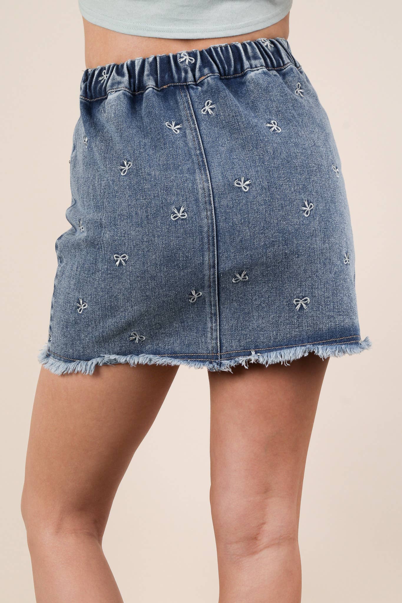 Posey Bow Embellished MW Jean Skirt