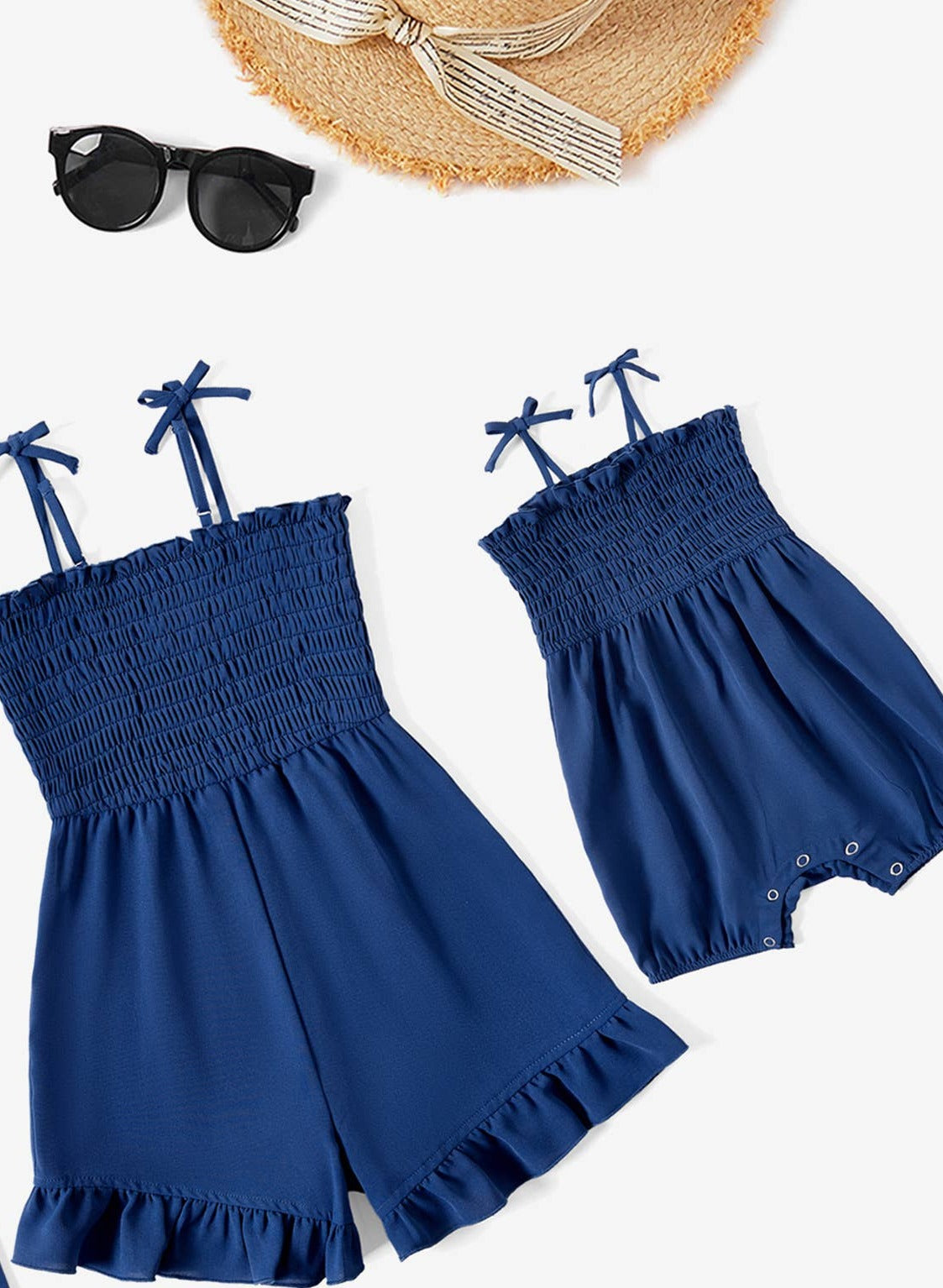 Baby & Youth Girls Navy Smocked Romper
