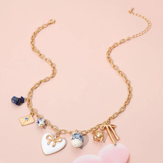 Delaney Coquette Ceramic Pearl Charm Necklace