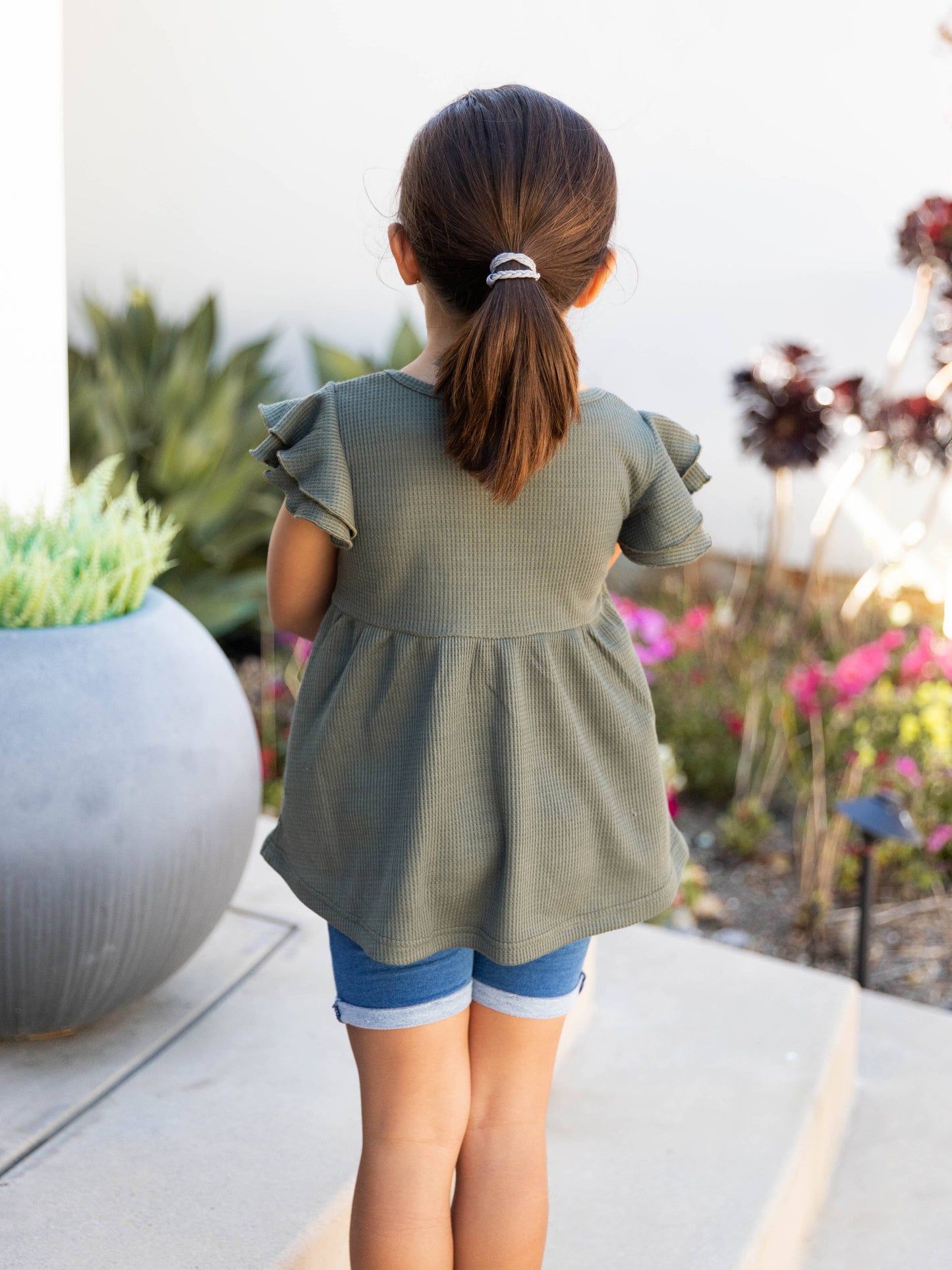 Girls Flutter Sleeve Waffle Peplum Blouse