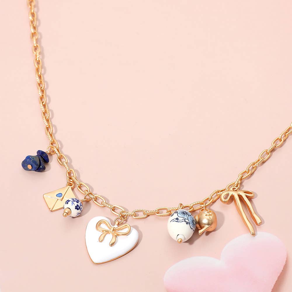 Delaney Coquette Ceramic Pearl Charm Necklace