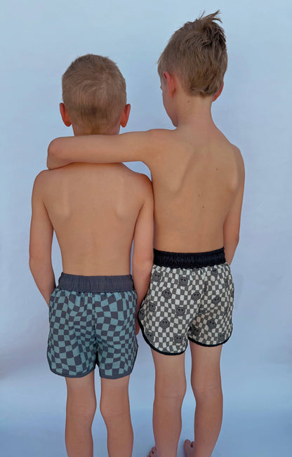 Boys Blue Wavy Checkered Swim Trunks