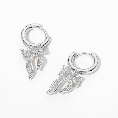 Darla Crystal Bow Huggie Earrings