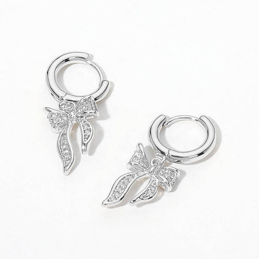 Darla Crystal Bow Huggie Earrings