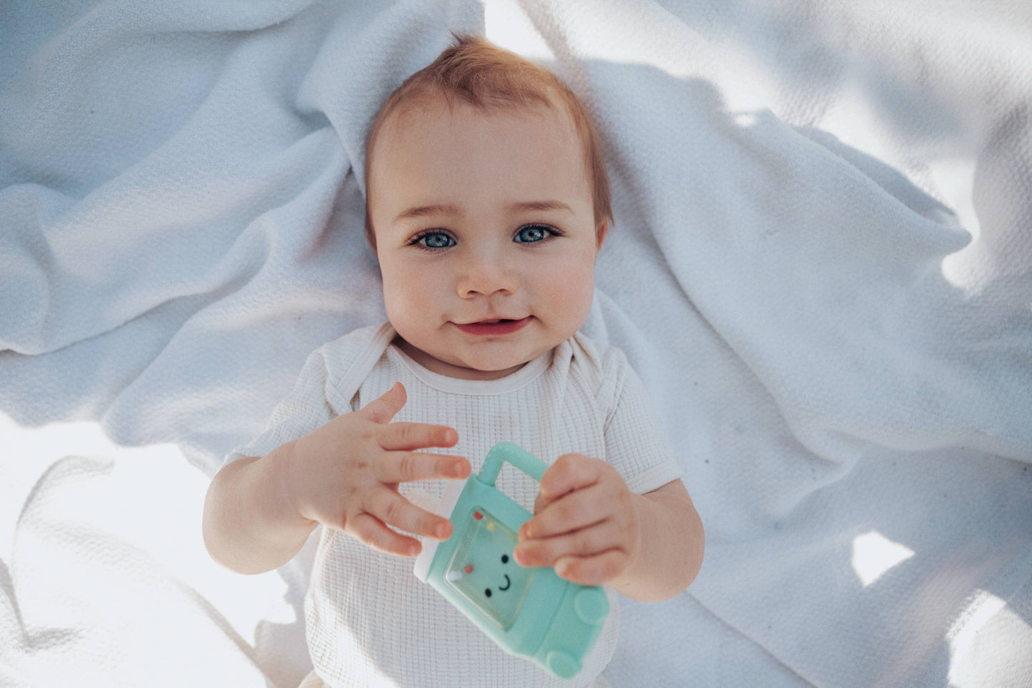 Itzy Ritzy Sweetie Shake Plus™ - Teething + Rattle Toy: Tumbler